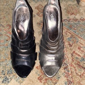 One black pair and one olive gold pair heels